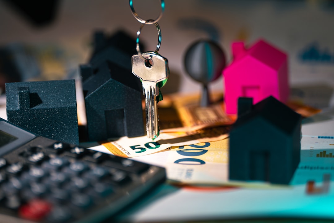 House model, calculator and keys representing an Ontario financing condition